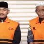 Bupati Bekasi non aktif, Ade Kuswara Kunang (kiri) dan HM Kunang (kanan)